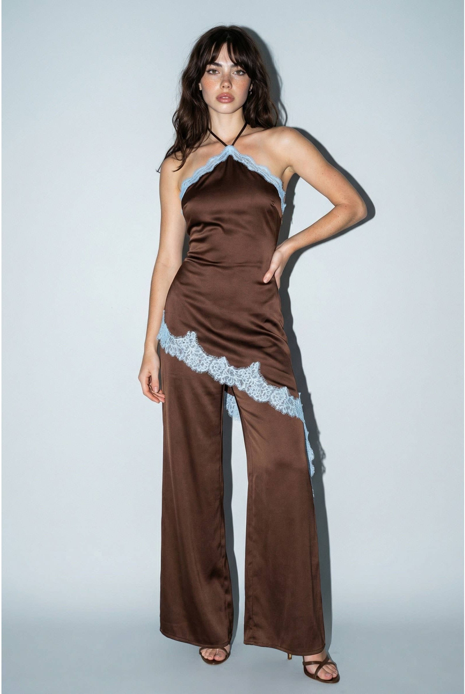 Full-length front view of wide-leg satin halter jumpsuit with lace trim