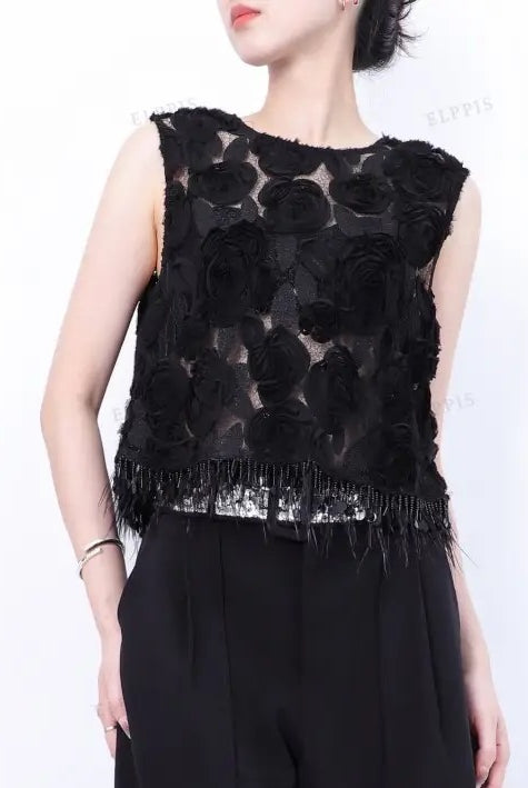 Black sleeveless statement blouse