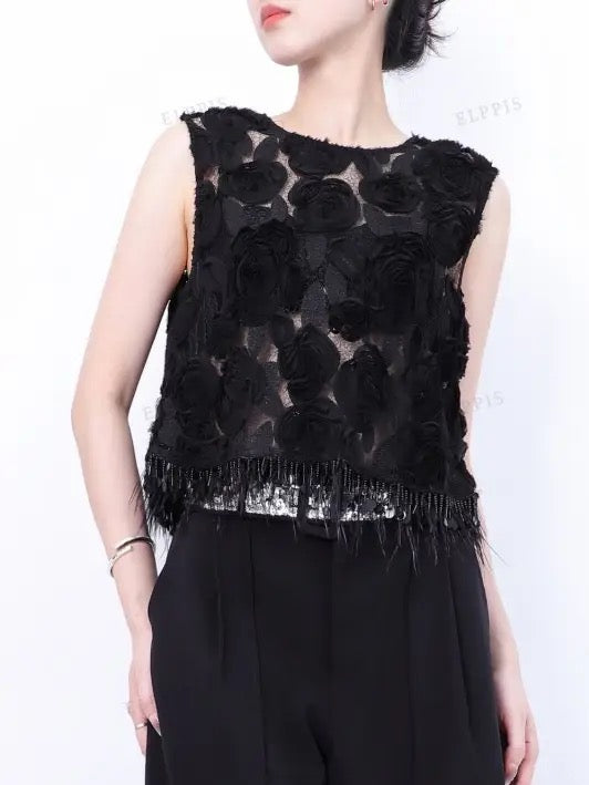 Black sleeveless statement blouse