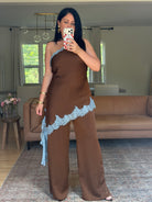 Contrast lace trim satin halter jumpsuit, wide-leg silhouette, full length view