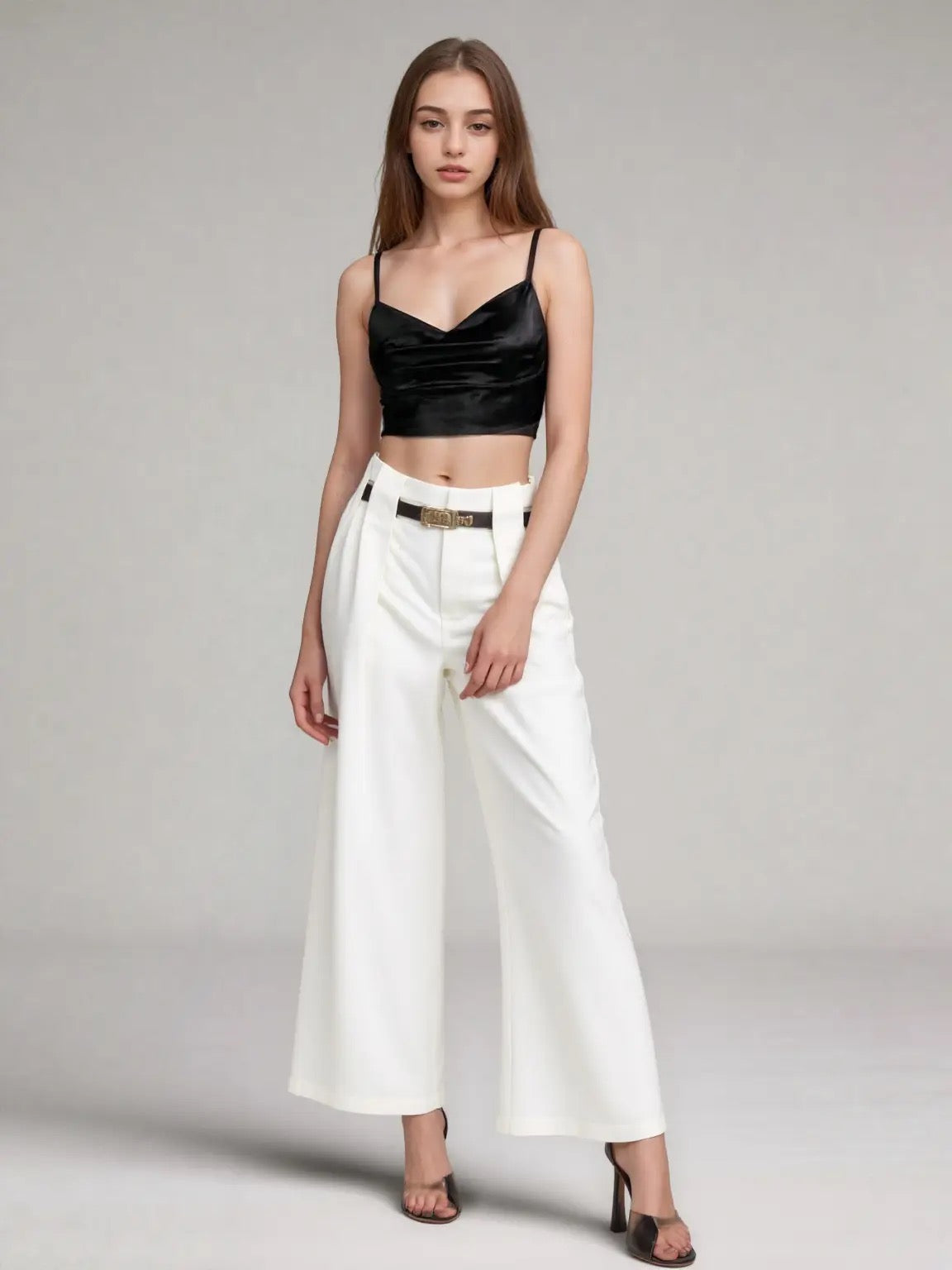 white high-waisted wide leg pants with belt detail.